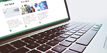 Aufgeklappter Laptop mit BFW Seite